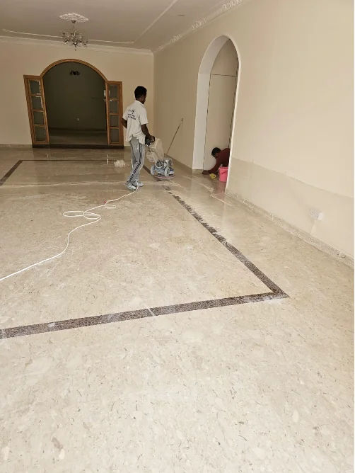 Technicians polishing a stone floor at Miami Park Sar