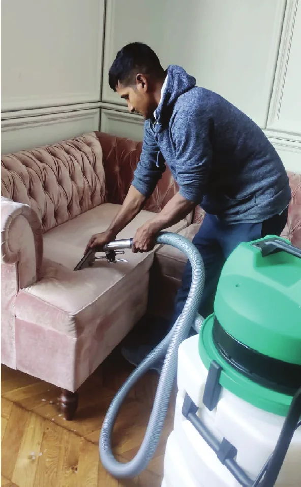 Skill Line technician cleaning upholstered furniture